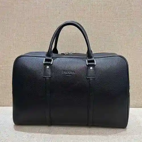 PRA@DA La bolsa de viaje exclusiva para hombres está hecha de cuero original importado de primer niv