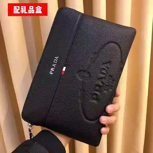 PRA@DA El bolso exclusivo para hombres está hecho de piel de vaca original importada y una bolsa de 