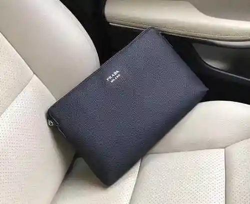 PRA@DA El único bolso para hombre está hecho de piel de vaca original importada y una bolsa de regal