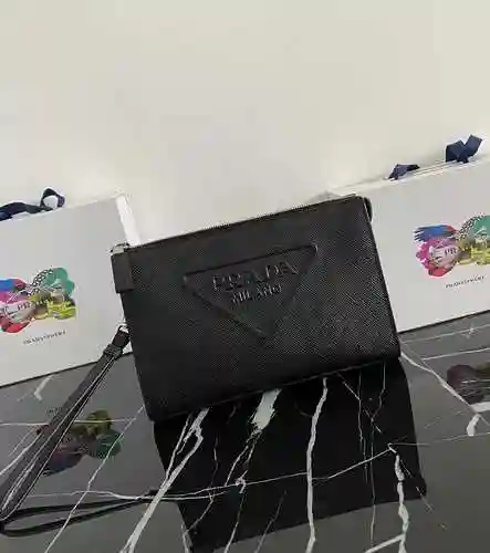 PRA@DA El bolso exclusivo para hombres está hecho de piel de vaca original importada y una bolsa de 