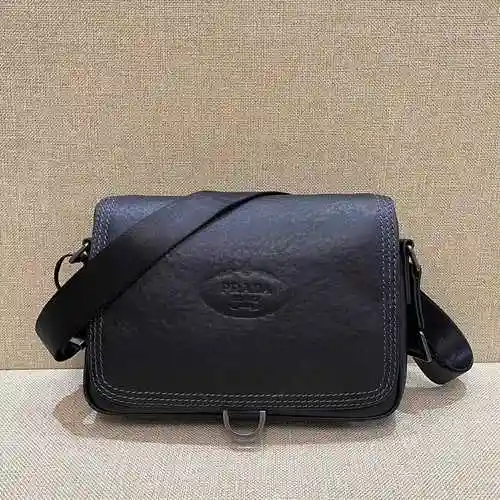 PRA@DA El bolso cruzado para hombre está hecho de cuero original importado de primer nivel y una ver