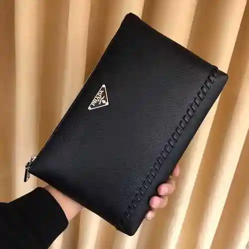 PRA@DA El bolso exclusivo para hombres está hecho de piel de vaca original importada y una bolsa de 