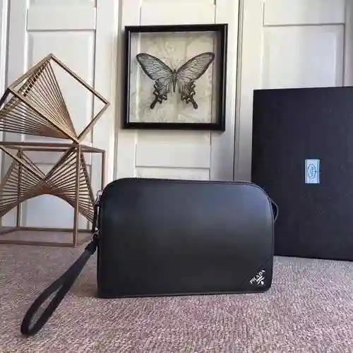 PRA@DA El bolso exclusivo para hombres está hecho de piel de vaca original importada y una bolsa de 