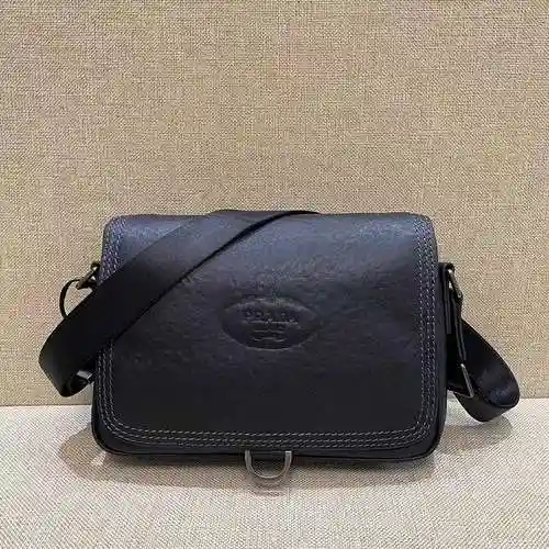 PRA@DA El bolso cruzado para hombre está hecho de cuero original importado de primer nivel y una ver
