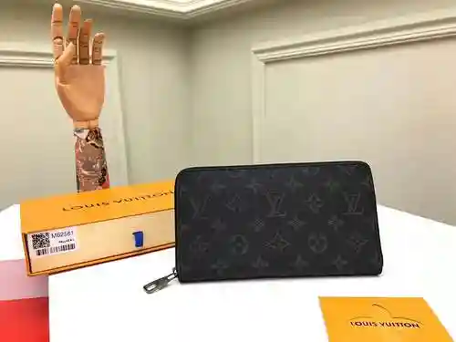 La billetera con clip largo exclusiva para hombres adopta una versión de réplica de lona original im