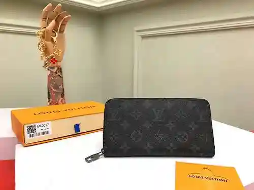 La billetera con clip largo exclusiva para hombres adopta una versión de réplica de lona original im