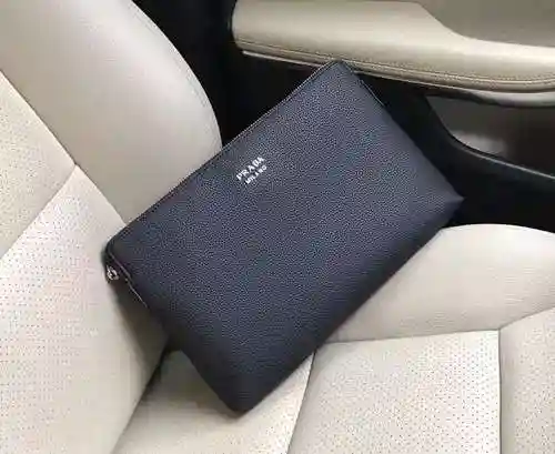 PRA@DA El único bolso para hombre está hecho de piel de vaca original importada y una bolsa de regal
