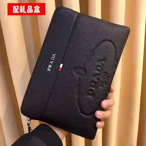 PRA@DA El bolso exclusivo para hombres está hecho de piel de vaca original importada y una bolsa de 