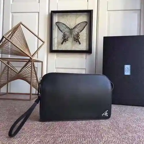 PRA@DA El bolso exclusivo para hombres está hecho de piel de vaca original importada y una bolsa de 