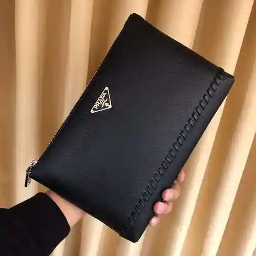 PRA@DA El bolso exclusivo para hombres está hecho de piel de vaca original importada y una bolsa de 