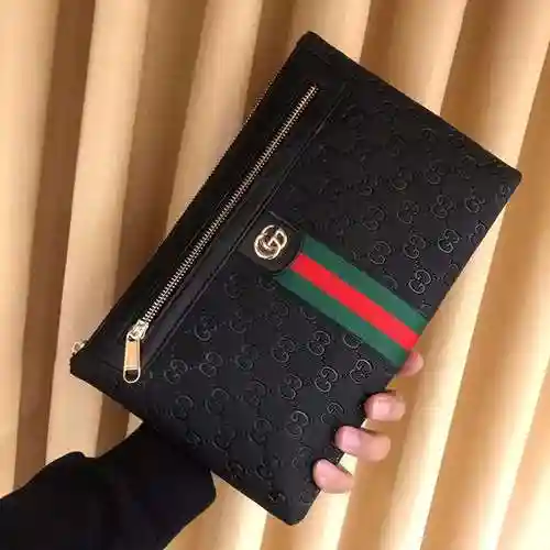 El bolso exclusivo para hombre GUCC está hecho de piel de vaca original importada, con una bolsa de 