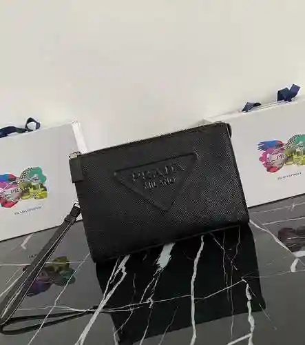 PRA@DA El único bolso para hombre está hecho de piel de vaca original importada y una bolsa de regal