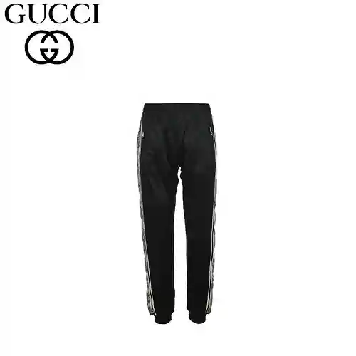 Pantalones con logo bordado y estampado de serpiente de G*cci/Gucci