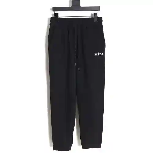 Pra*da 23FW pantalones con bordado de villano