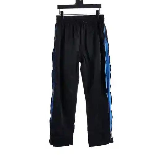 BV Bottega Veneta 23FW pantalón multifunción con cremallera a juego en color negro y azul