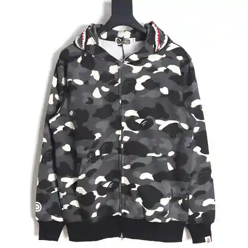 Sudadera con capucha luminosa de patchwork de camuflaje blanco y negro clásica BA*PE