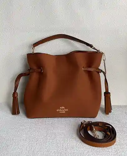 coa @Chi Bolso con borlas Hecho de piel de vaca original importada, alta calidad, entrega en factura
