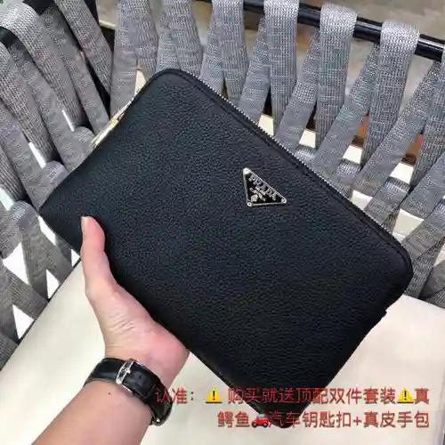PRA@DA Clutch para Hombre Elaborado en piel vacuna original importada, alta calidad, entrega en bols