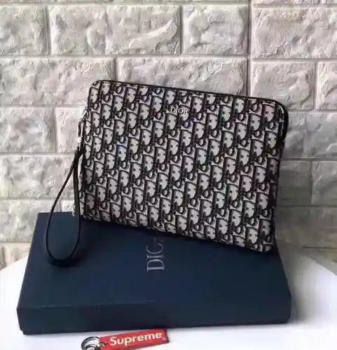 Bolso de mano DI para hombre, elaborado en piel vacuna original importada, alta calidad, entrega en 