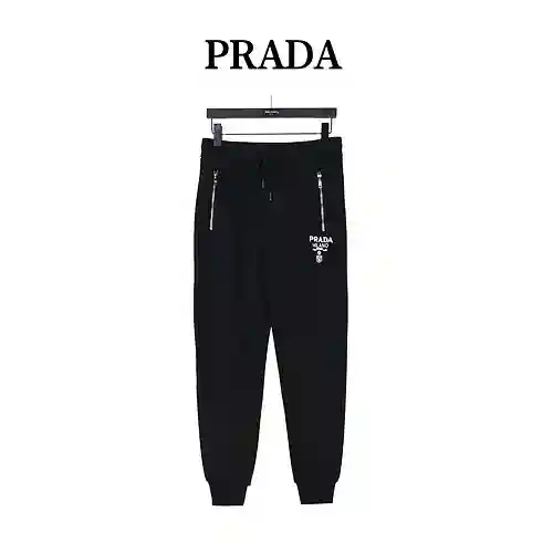 Logotipo Pra*da/Prada bordado y bolsillo de nailon con logotipo triangular, además de pantalones tip