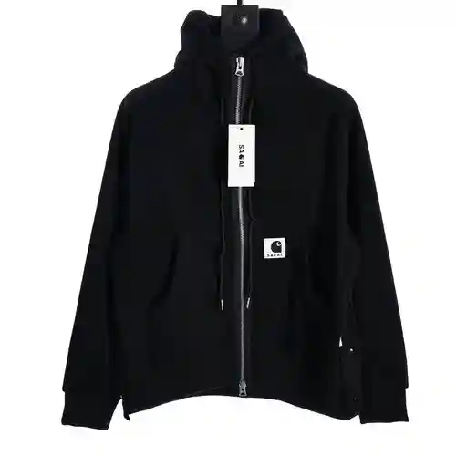 Sacai x Carhartt WIP FW23 Sudadera de patchwork con capucha y abertura con cremallera y logo de Carh