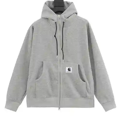 Sacai x Carhartt WIP FW23 Sudadera de patchwork con capucha y abertura con cremallera y logo de Carh