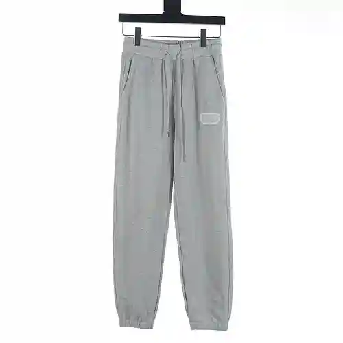 Pantalón Dior CD 23FW con etiqueta plateada bordada