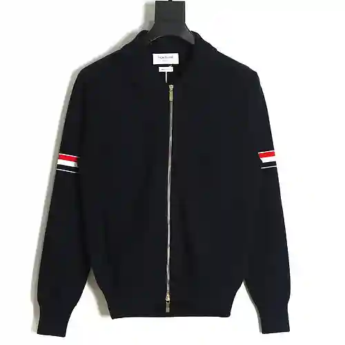 Chaqueta con cremallera TB 22FW y tejido en el brazo