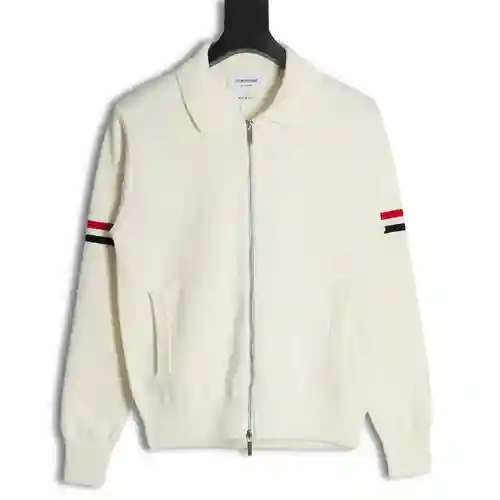 Chaqueta con cremallera TB 22FW y tejido en el brazo