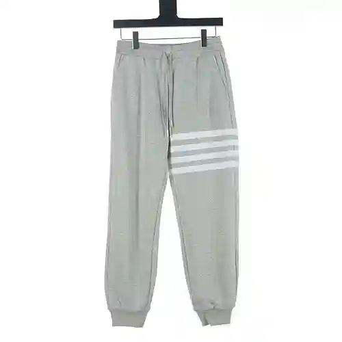 Tom Brown TB pantalones deportivos de polar con diseño de patchwork y cuatro barras