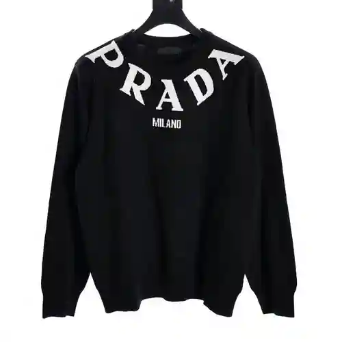 Jersey de jacquard tridimensional con collar en el pecho y letras serie PRA*DA