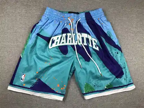Versión de bolsillo de los pantalones de baloncesto azules swingman de los Hornets Justin Juston