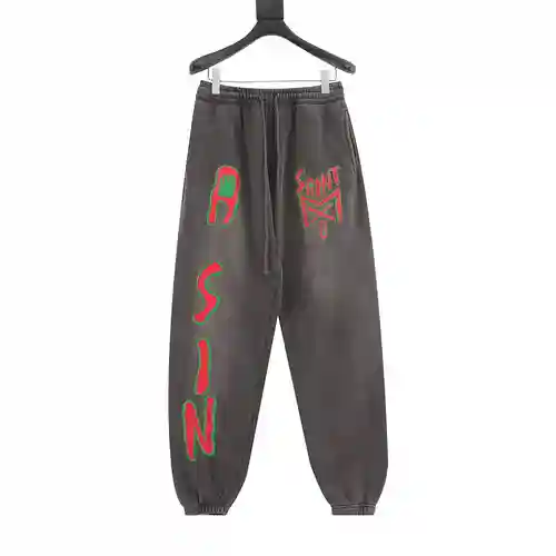 SAINT*MICHAEL 23FW Pantalón con estampado de letras MX6 rojo y verde graffiti