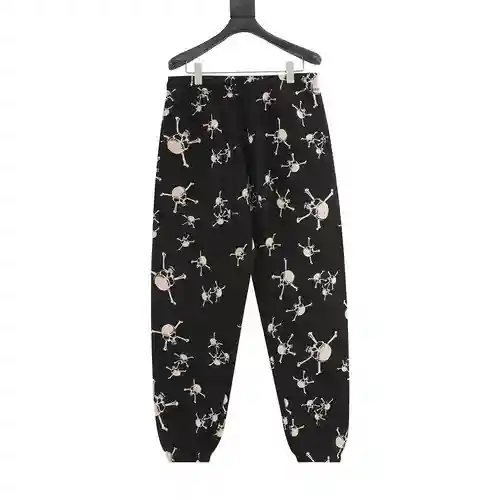 SAINT*MICHAEL X SHERMER pantalón conjunto 23FW con estampado de calaveras