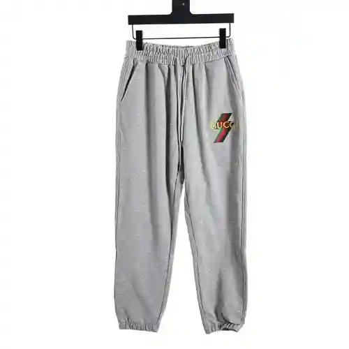 GU*CCI pantalones con estampado de rayos