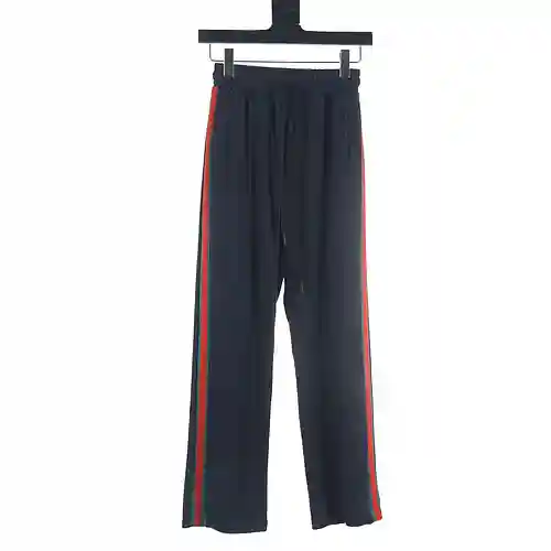 Gucci GUC 23Fw pantalones color block con cinta a rayas rojas y verdes
