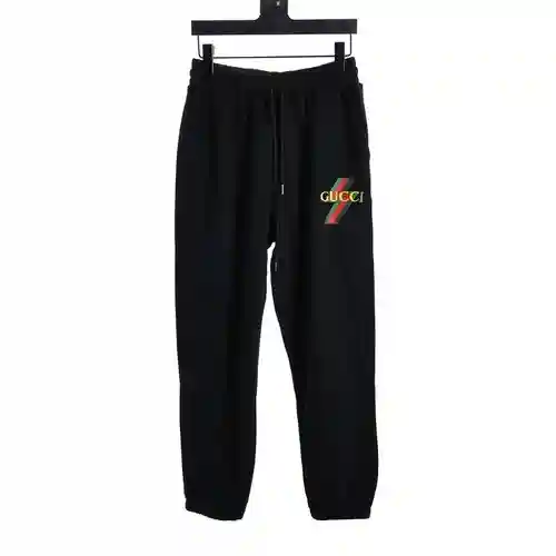 GU*CCI pantalones con estampado de rayos