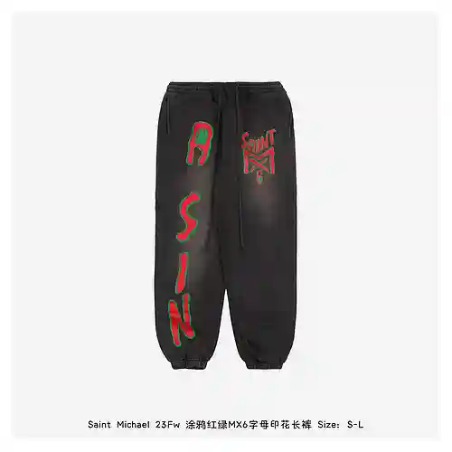 Saint*Michael 23Fw Pantalón con estampado de letras MX6 rojo y verde graffiti