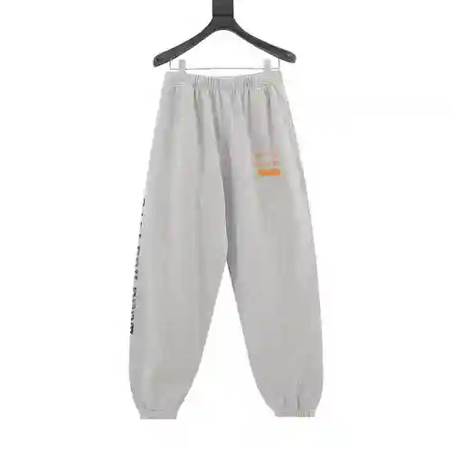 SAINT*MICHAEL 23FW Pantalón con estampado de letras inglesas y logo naranja