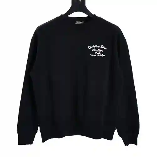 Sudadera de cuello redondo con letras de la firma CD bordadas en la parte delantera y trasera