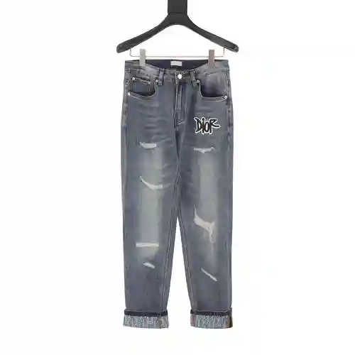 jeans con bolsillo para CD y logo bordado