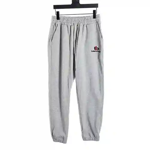 Pantalón BLCG Balenciaga con botones bordados