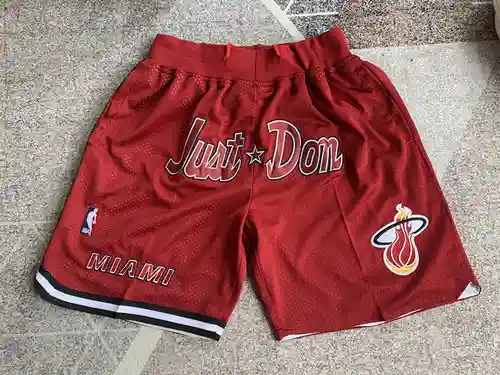 Pantalones de bolsillo Pantalones de baloncesto rojos en forma de J Heat