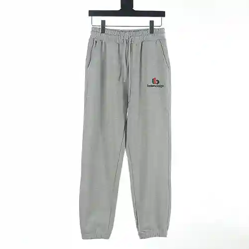 Balenciaga BLCG 23FW pantalón con botones y letras bordadas