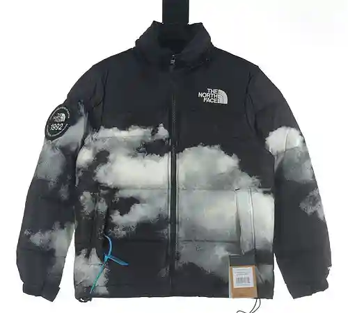 Chaqueta de plumas con estampado tie-dye y copos de nieve en blanco TNF 1992 de North Face