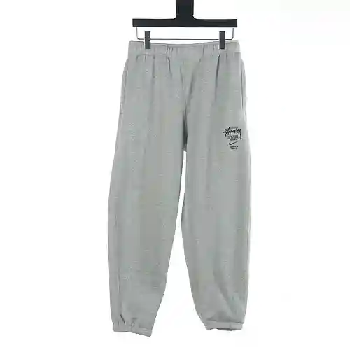 Nike NK x Stussy/Stussy conjunto de color sólido bordado LOGO más pantalones deportivos de terciopel
