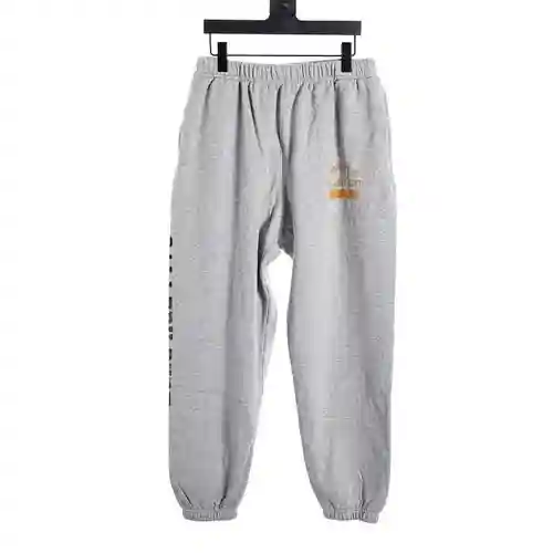 SAINT*MICHAEL 23FW Pantalón con estampado de letras inglesas y logo naranja