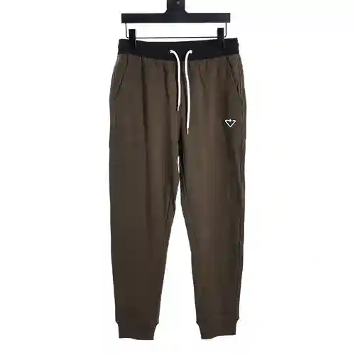 Pantalones con bolsillo de nailon con logo triangular bordado de PRA*DA