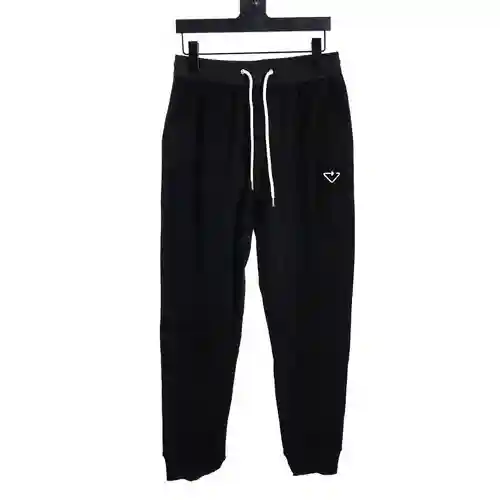 Pantalones con bolsillo de nailon con logo triangular bordado de PRA*DA