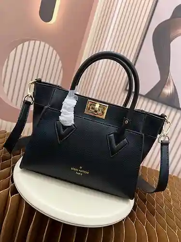 El bolso LL está hecho de piel de vaca original importada, calidad de alta gama, factura de bolsa de